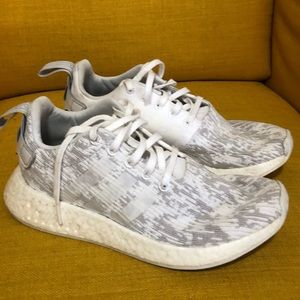 Women’s white Adidas Boost running shoes